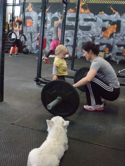 Violaine and son in the gym